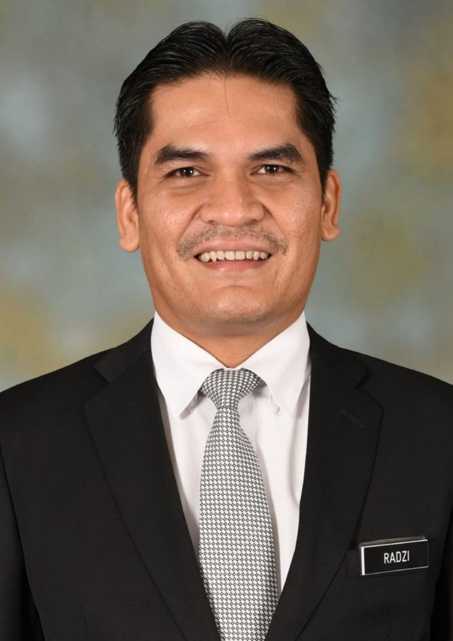 H E Dr. Radzi Jidin